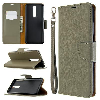Solid Color Litchi Pattern Wrist Strap Side Flip Shockproof PU Leather + Soft TPU Card Slots with Magnetic Buckle and Stand Wallet Case for Samsung Galaxy A01