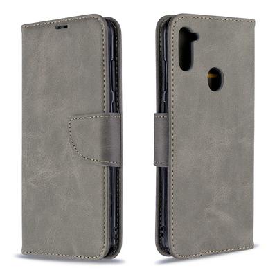 Solid Color Sheep Pattern Wrist Strap Style Shock-Absorption Side Flip PU Leather + Soft TPU Card Slots with Magnetic Buckle and Stand Wallet Case for Samsung Galaxy A11