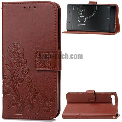 Embossed Lucky Four-Leaf Clover Pattern Wrist Strap PU Leather + Soft TPU Card Holder with Stand and Magnetic Buckle Case for Sony Xperia XZ Premium - Brown