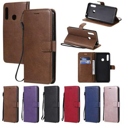 Solid Color Wrist Strap Style Shockproof Side Flip PU Leather + Soft TPU Card Slots with Magnetic Buckle and Stand Wallet Case for Samsung Galaxy A70e