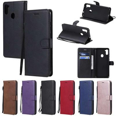Solid Color Wrist Strap Style Shockproof Side Flip PU Leather + Soft TPU Card Slots with Magnetic Buckle and Stand Wallet Case for Samsung Galaxy M11